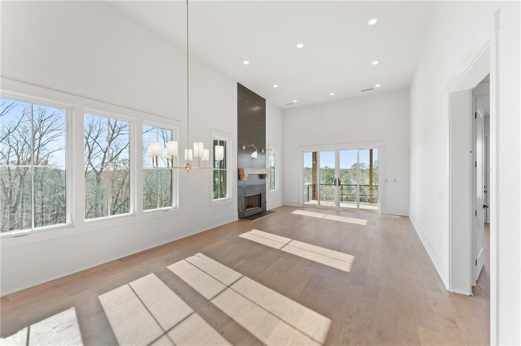 1090 Lupo Loop Chattahoochee Hills, GA 30268 - Photo 8 of 23 a view of an empty room with a window