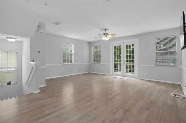 a view of a balcony with wooden floor