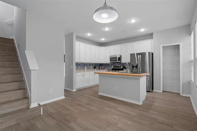 a view of empty room with windows