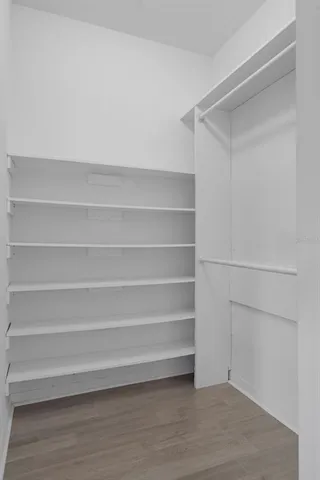 a view of a hallway with washer and dryer