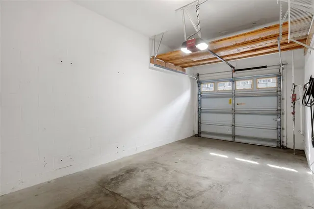 a view of room that has a bed