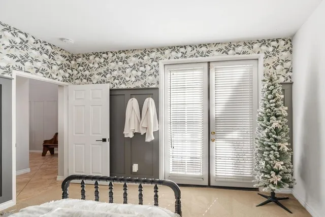 a kitchen with stainless steel appliances granite countertop a sink refrigerator and cabinets