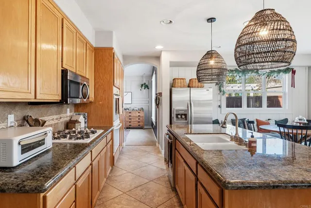 a living room with furniture windows and a fireplace