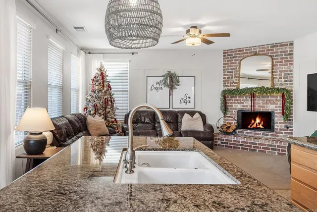 a bedroom with a bed and a table