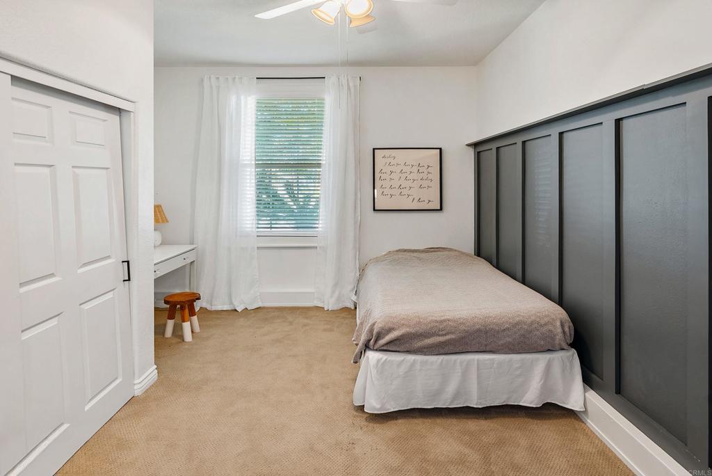 561 Chesterfield Circle San Marcos, CA 92069 - Photo 22 of 70 a bedroom with a bed and a window