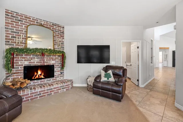 a bathroom with a bathtub a sink and a window