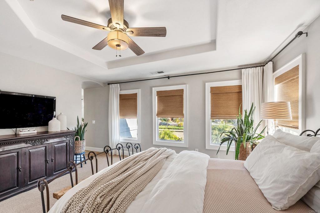 561 Chesterfield Circle San Marcos, CA 92069 - Photo 28 of 70 a bedroom with a bed and a flat screen tv