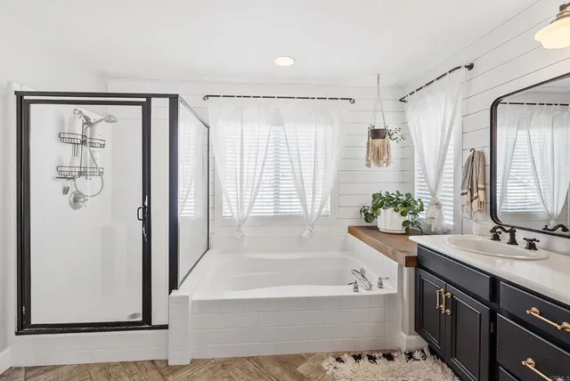 a building outdoor space with patio furniture and potted plants