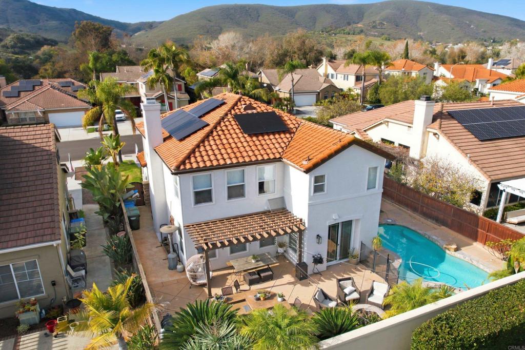 561 Chesterfield Circle San Marcos, CA 92069 - Photo 41 of 70 an aerial view of a house with a yard