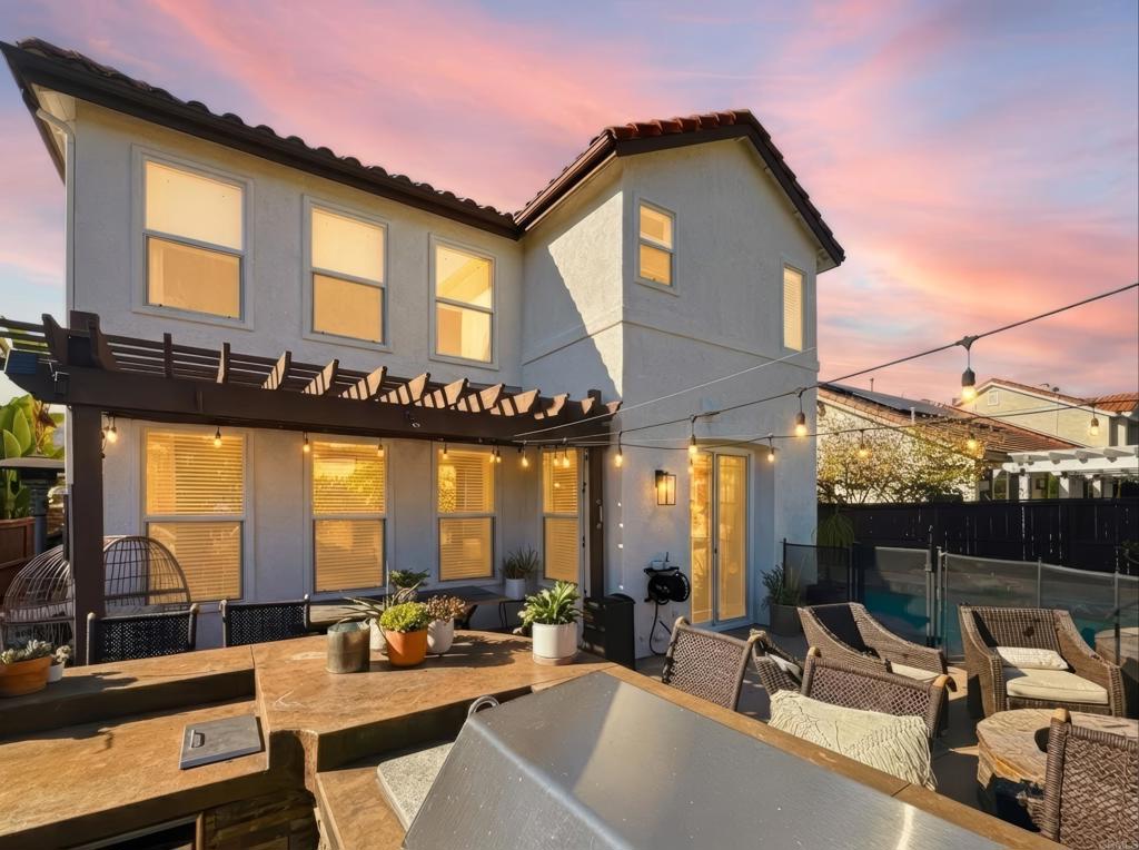 561 Chesterfield Circle San Marcos, CA 92069 - Photo 55 of 70 a view of a patio with swimming pool table and chairs