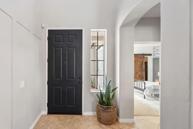 a bathroom with a toilet a sink and tub
