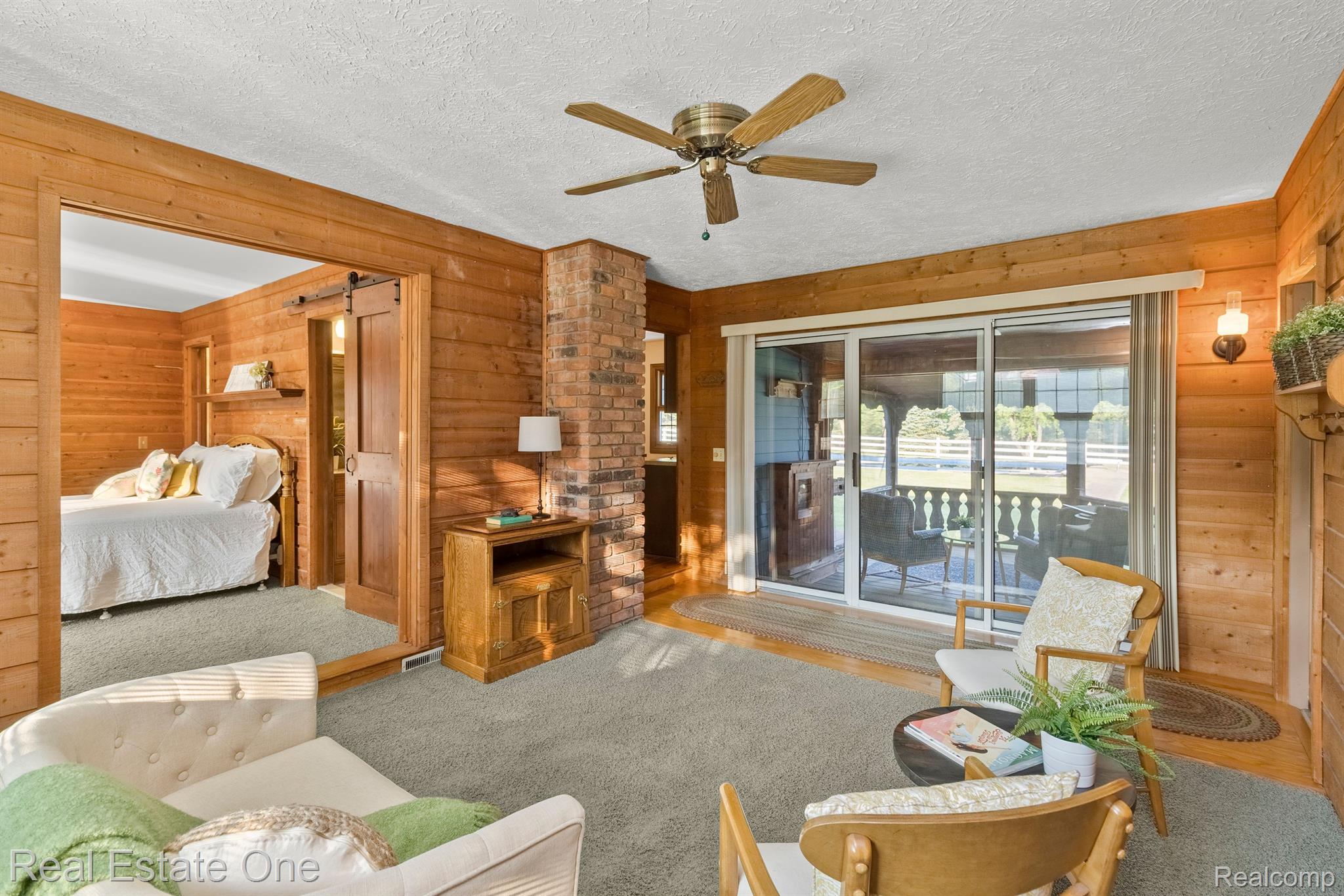 11260 Hartland Road Fenton, MI 48430 - Photo 26 of 73 Double pocket doors lead to primary suite