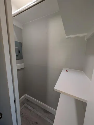 a view of small space with racks on the wall