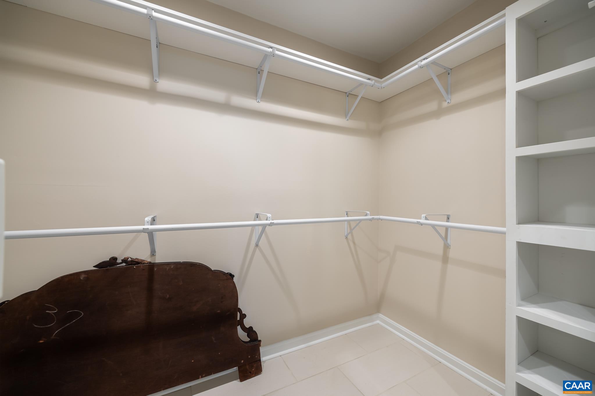 3272 Arbor Trace Charlottesville, VA 22911 - Photo 18 of 46 a view of a room with racks on the wall