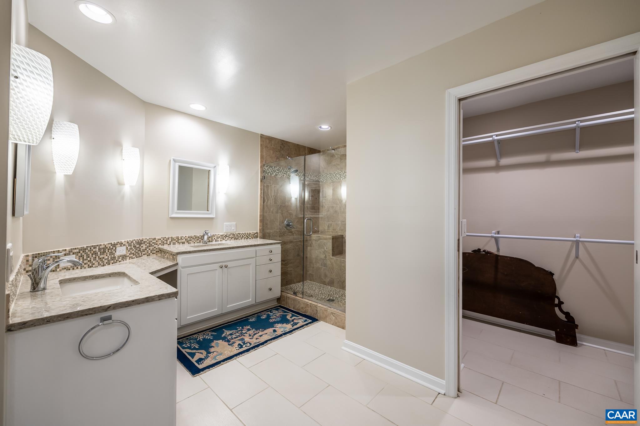 3272 Arbor Trace Charlottesville, VA 22911 - Photo 24 of 46 a bathroom with a sink a granite counter and a mirror