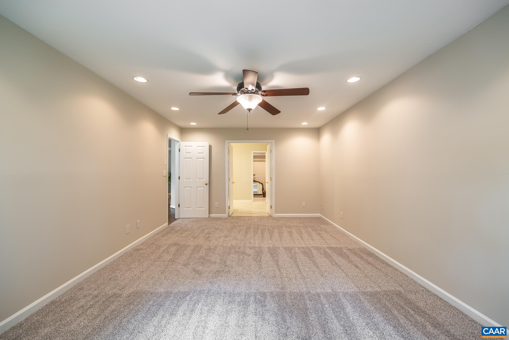 3272 Arbor Trace Charlottesville, VA 22911 - Photo 25 of 46 wooden floor in an empty room with a window