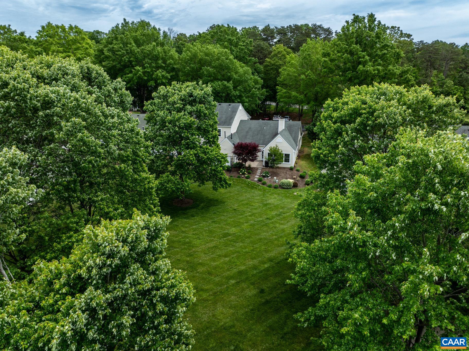 3272 Arbor Trace Charlottesville, VA 22911 - Photo 34 of 46 a view of a backyard with sitting area