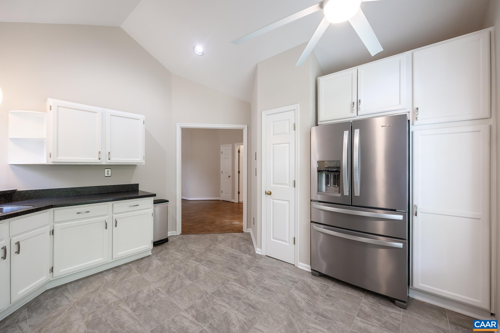 3272 Arbor Trace Charlottesville, VA 22911 - Photo 10 of 46 a kitchen with stainless steel appliances a refrigerator sink and cabinets