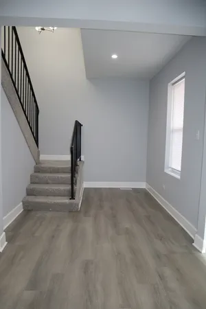 a view of entryway with stairs