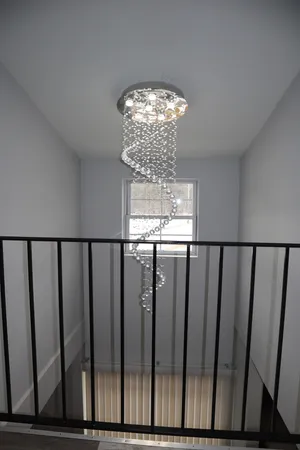 a bedroom with bed and window