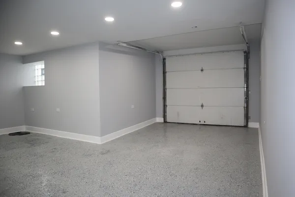 an empty room with a empty space and window