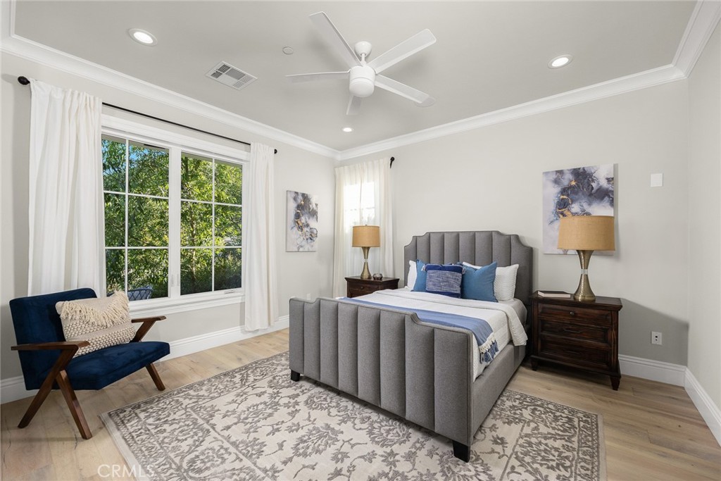 407 Oxford Drive Arcadia, CA 91007 - Photo 17 of 29 a bedroom with a large bed and a couch