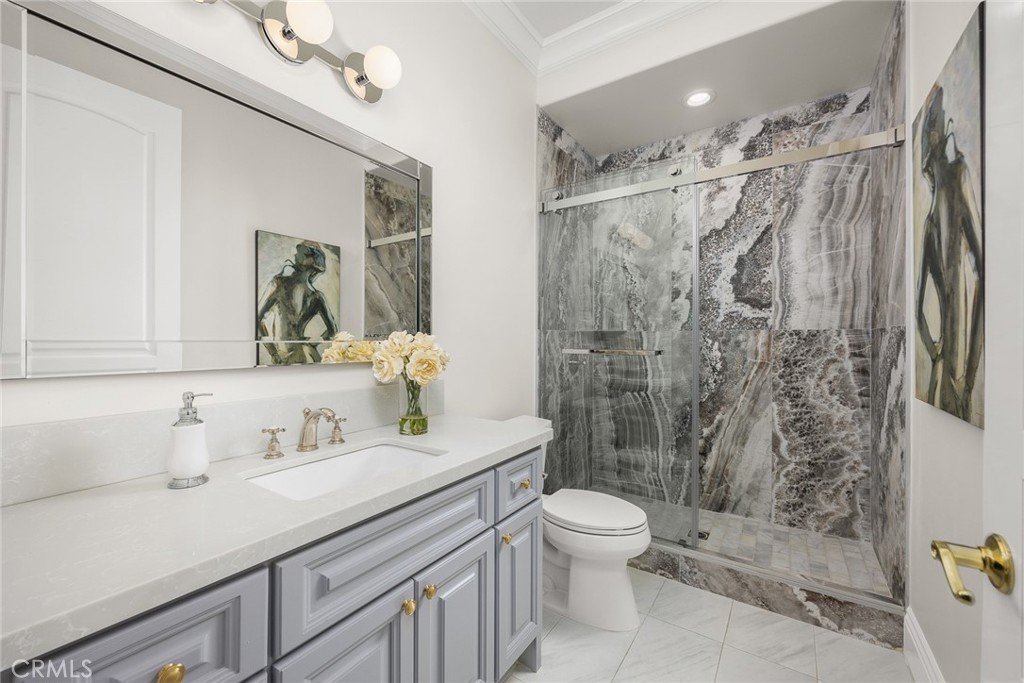 407 Oxford Drive Arcadia, CA 91007 - Photo 18 of 29 a bathroom with a sink a toilet and shower