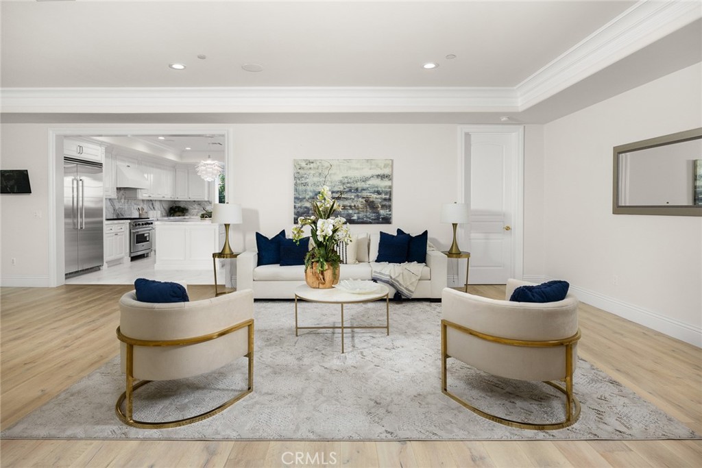 407 Oxford Drive Arcadia, CA 91007 - Photo 6 of 29 a living room with furniture a rug and white walls
