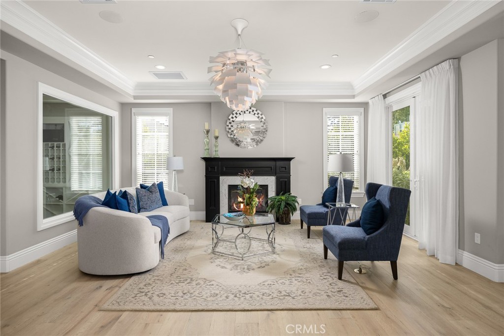 407 Oxford Drive Arcadia, CA 91007 - Photo 9 of 29 a living room with furniture and a fireplace