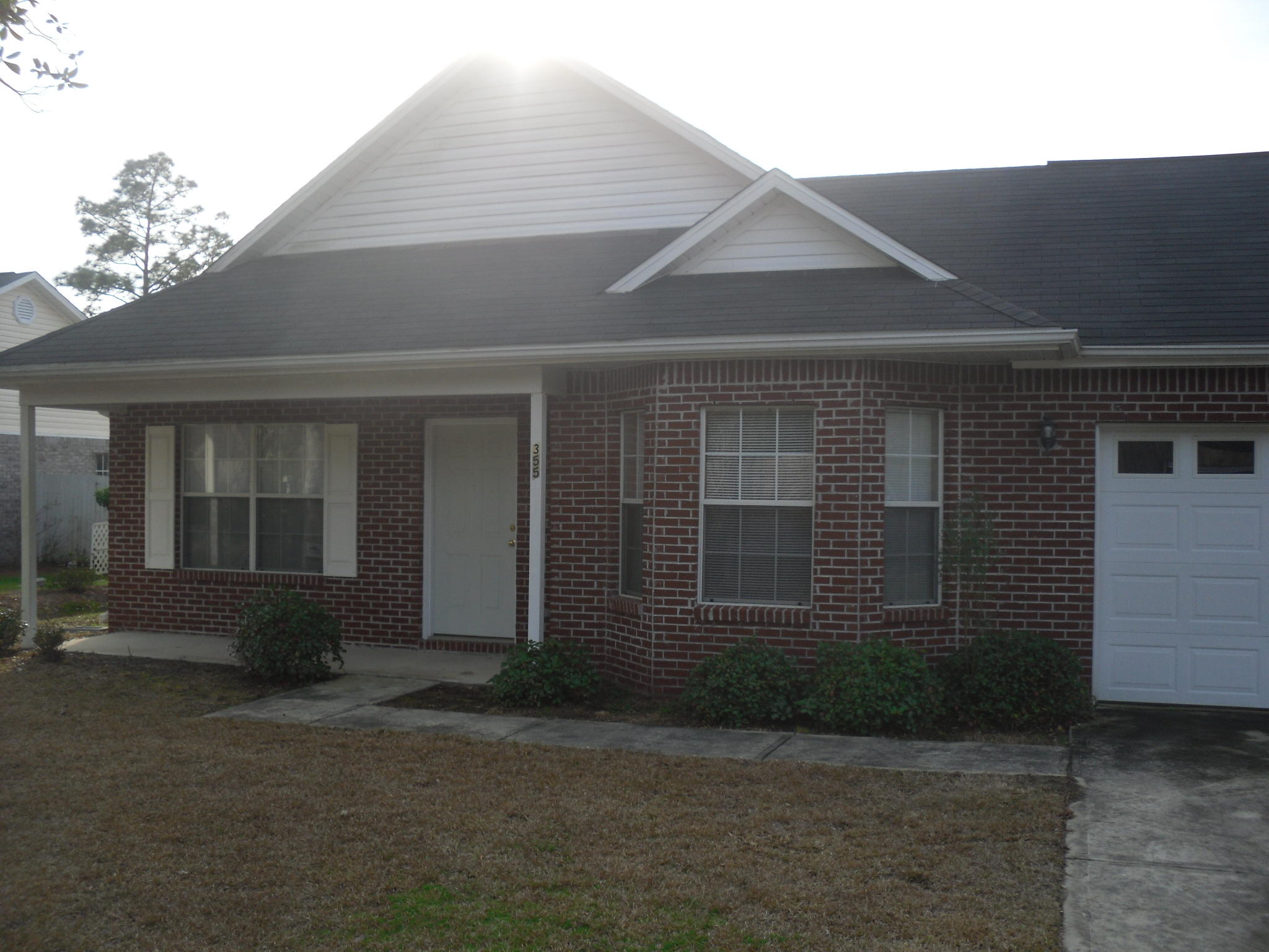 355 Bay Grove Road Freeport, FL 32439 - Photo 1 of 12 a front view of a house