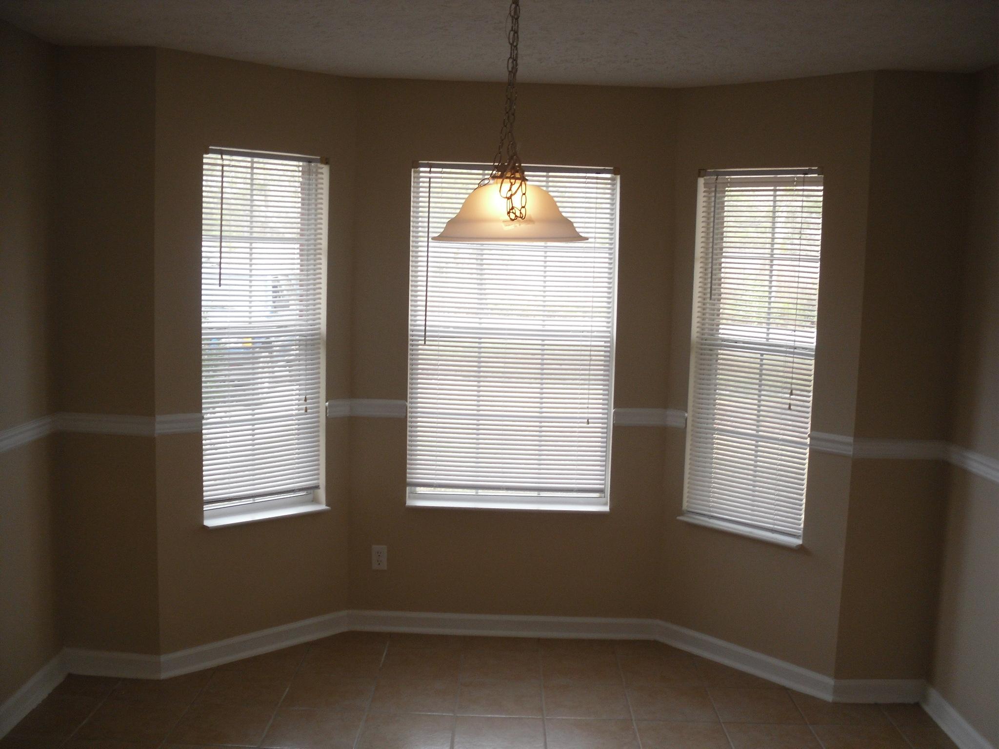 355 Bay Grove Road Freeport, FL 32439 - Photo 4 of 12 an empty room with a window