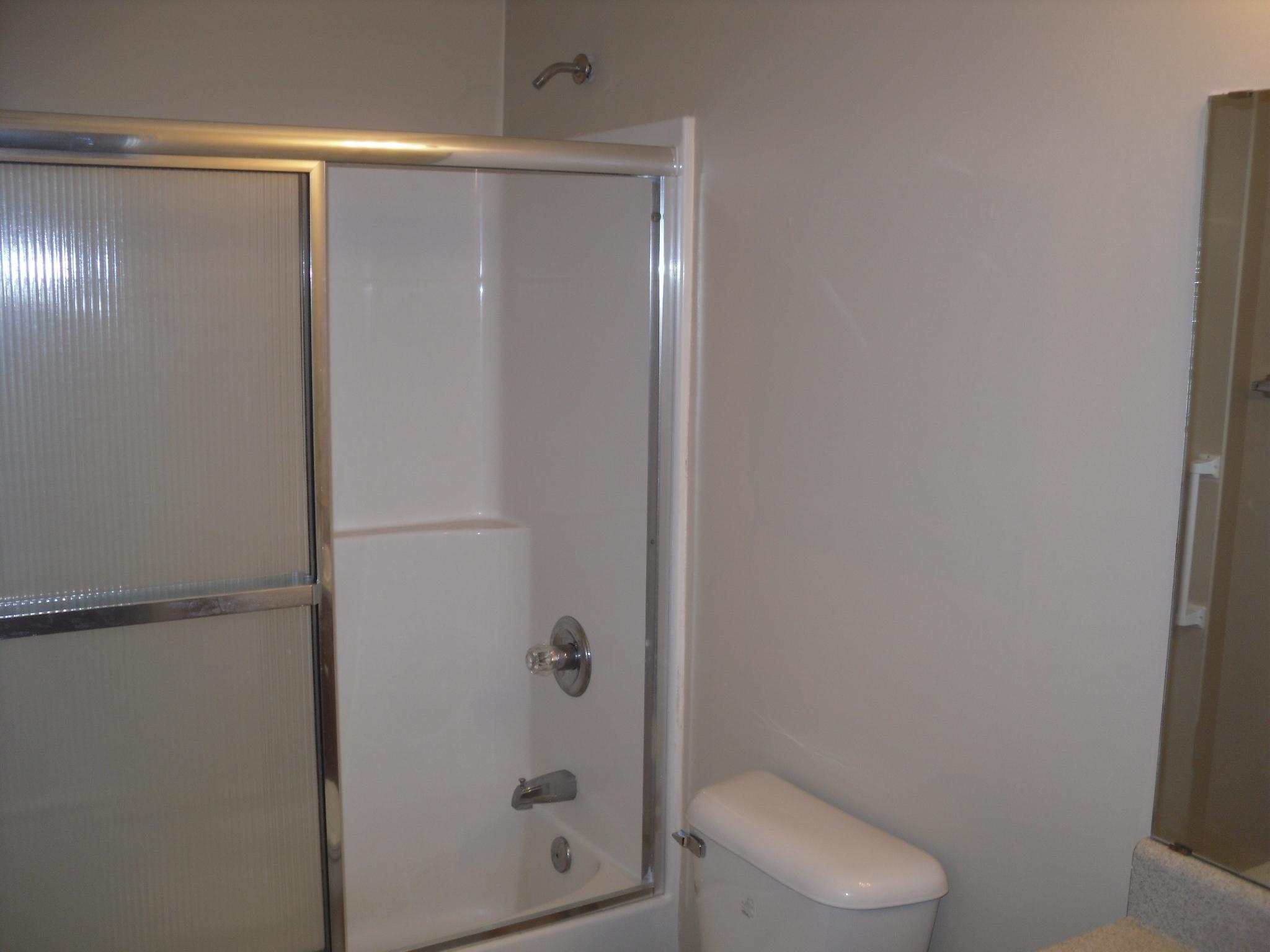 355 Bay Grove Road Freeport, FL 32439 - Photo 9 of 12 a bathroom with a shower and a toilet