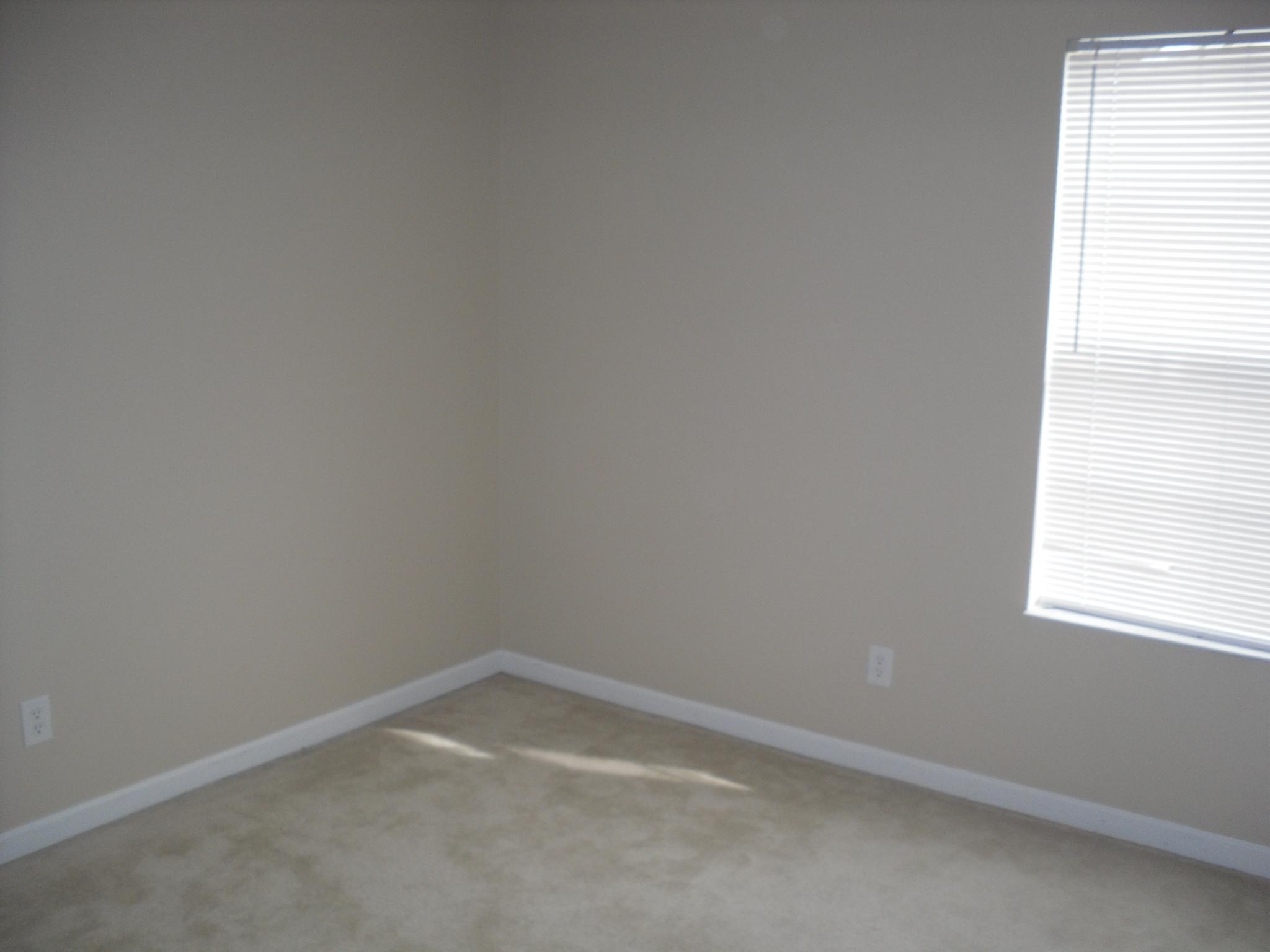 355 Bay Grove Road Freeport, FL 32439 - Photo 10 of 12 an empty room with a window