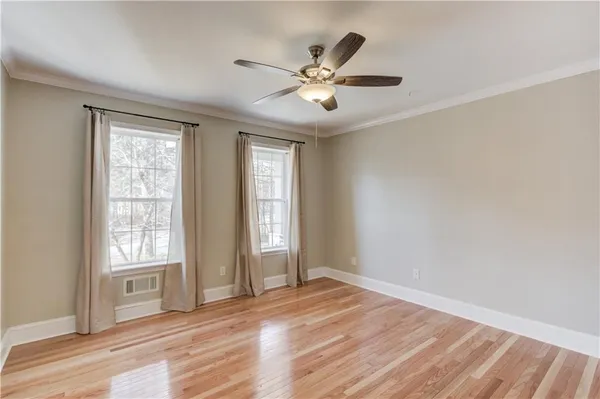 a view of an empty room and window