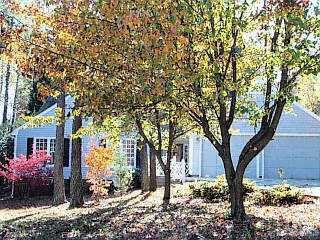 2000 Fountain Ridge Road Chapel Hill, NC 27517 - Photo 1 of 1 a front view of a house with garden