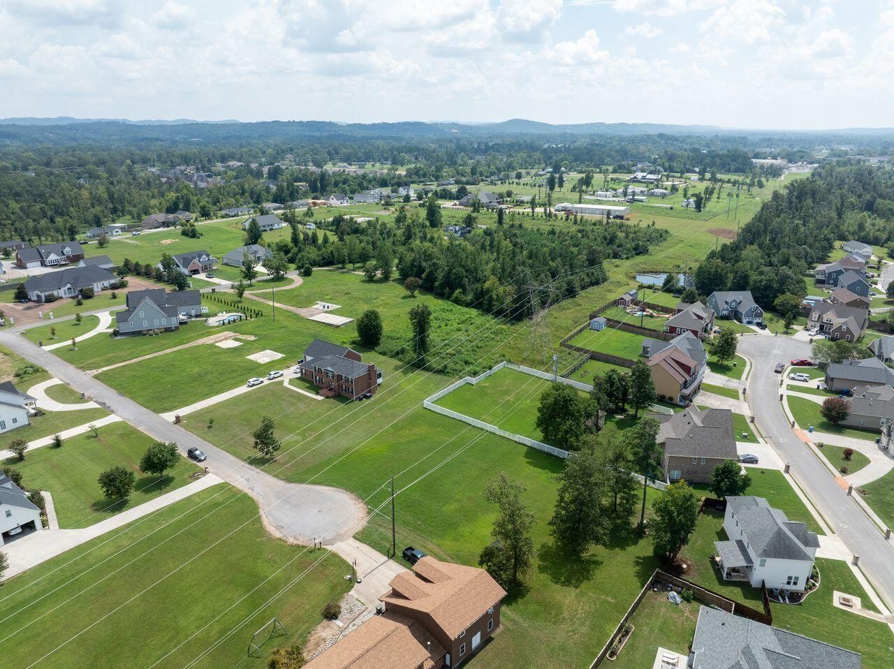 7548 Stephen Lane Chattanooga, TN 37421 - Photo 3 of 7 an aerial view of a city with lots of residential buildings
