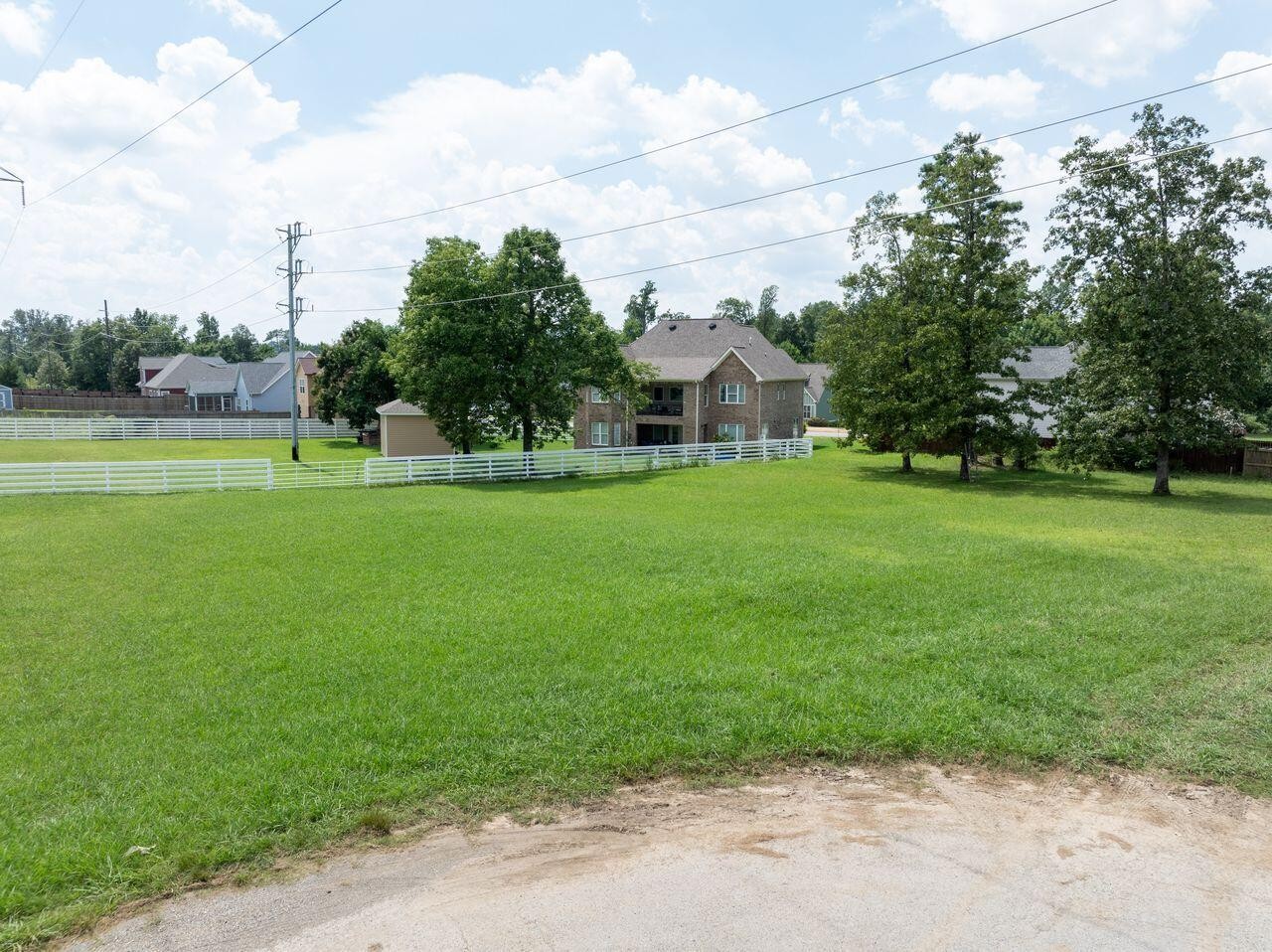 7548 Stephen Lane Chattanooga, TN 37421 - Photo 5 of 7 a view of a big yard with a house in the background