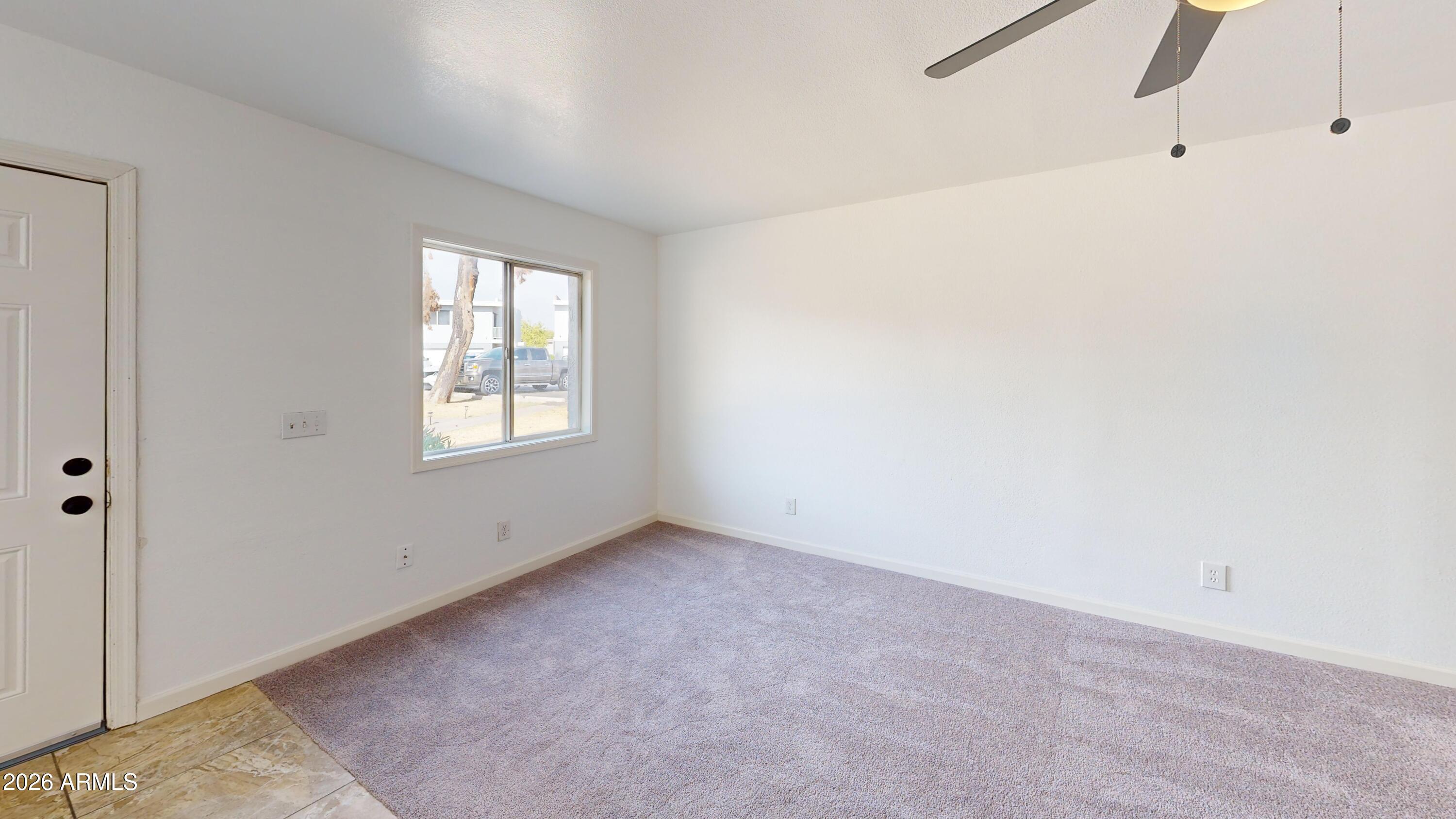 2629 West Ocotillo Road, Unit 2 Phoenix, AZ 85017 - Photo 16 of 21 2629-W-Ocotillo-Rd-Living-Room 1