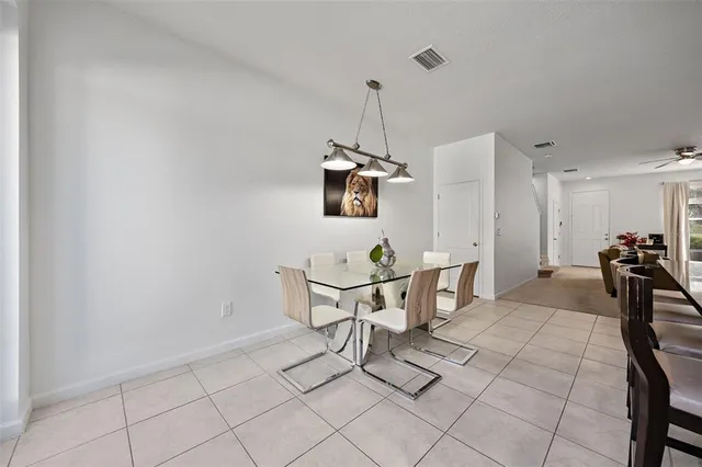 a bathroom with a light fixture and a mirror