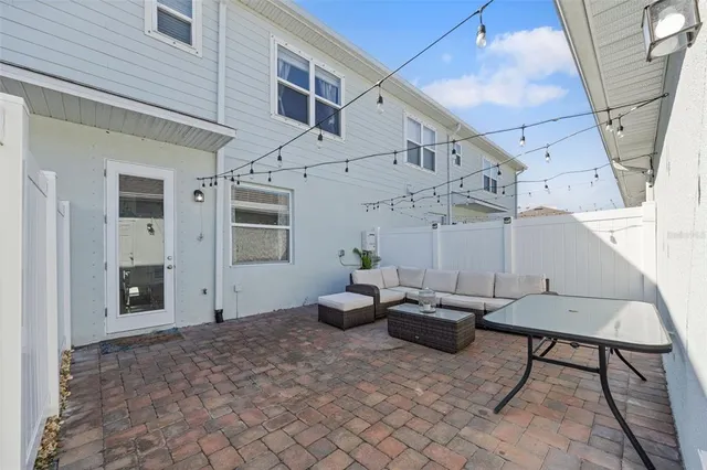 a view of backyard and hardwood