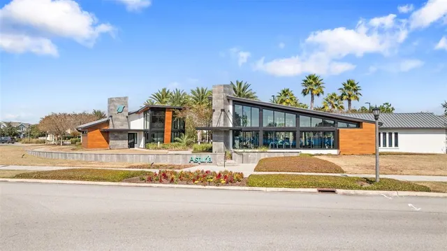 a lake view with palm trees