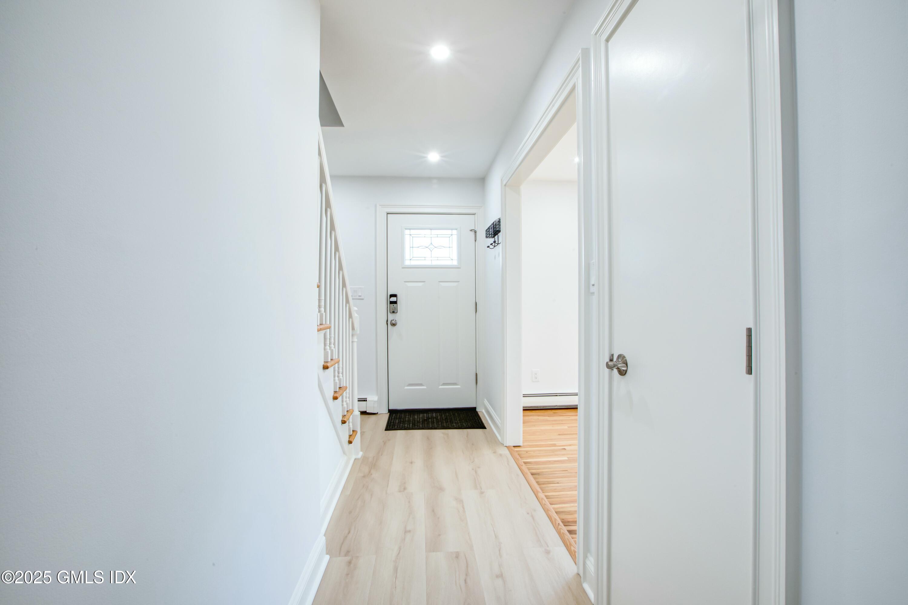 9 Apache Place Riverside, CT 06878 - Photo 23 of 23 a view of a hallway with wooden floor