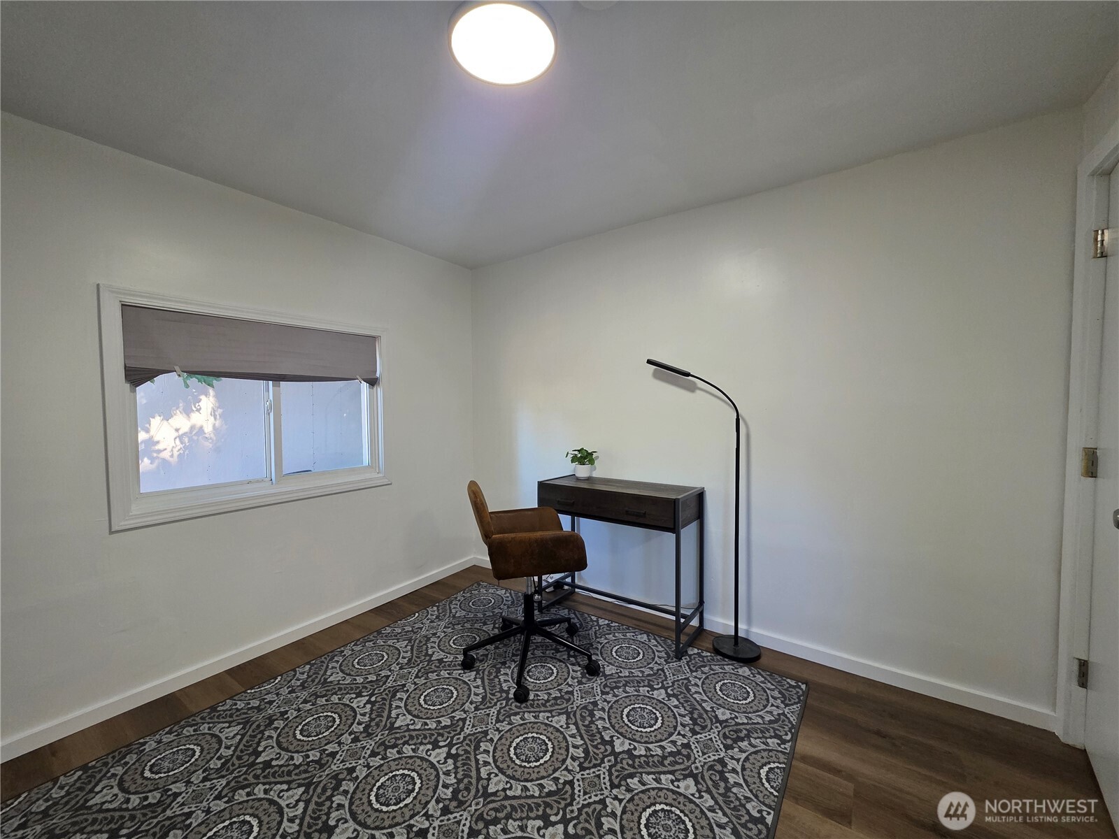 a chair and table in a room