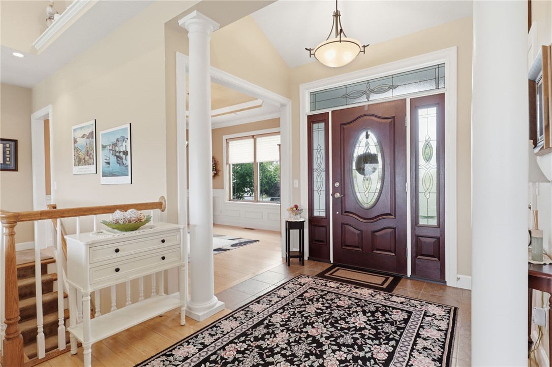 4536 Crystal Ridge Circle Gorham, NY 14424 - Photo 3 of 48 Elegant front foyer featuring sophisticated architectural columns.