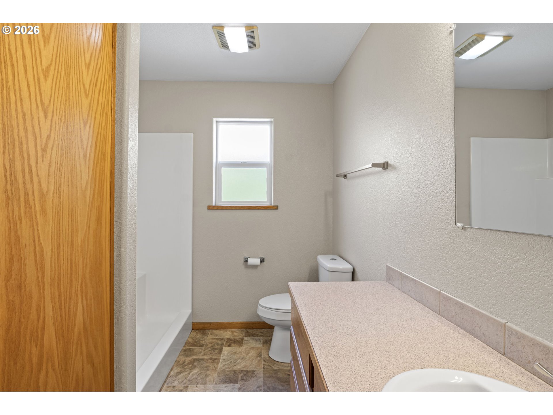 223 Armande Loop Roseburg, OR 97471 - Photo 18 of 35 a bathroom with a toilet and a sink