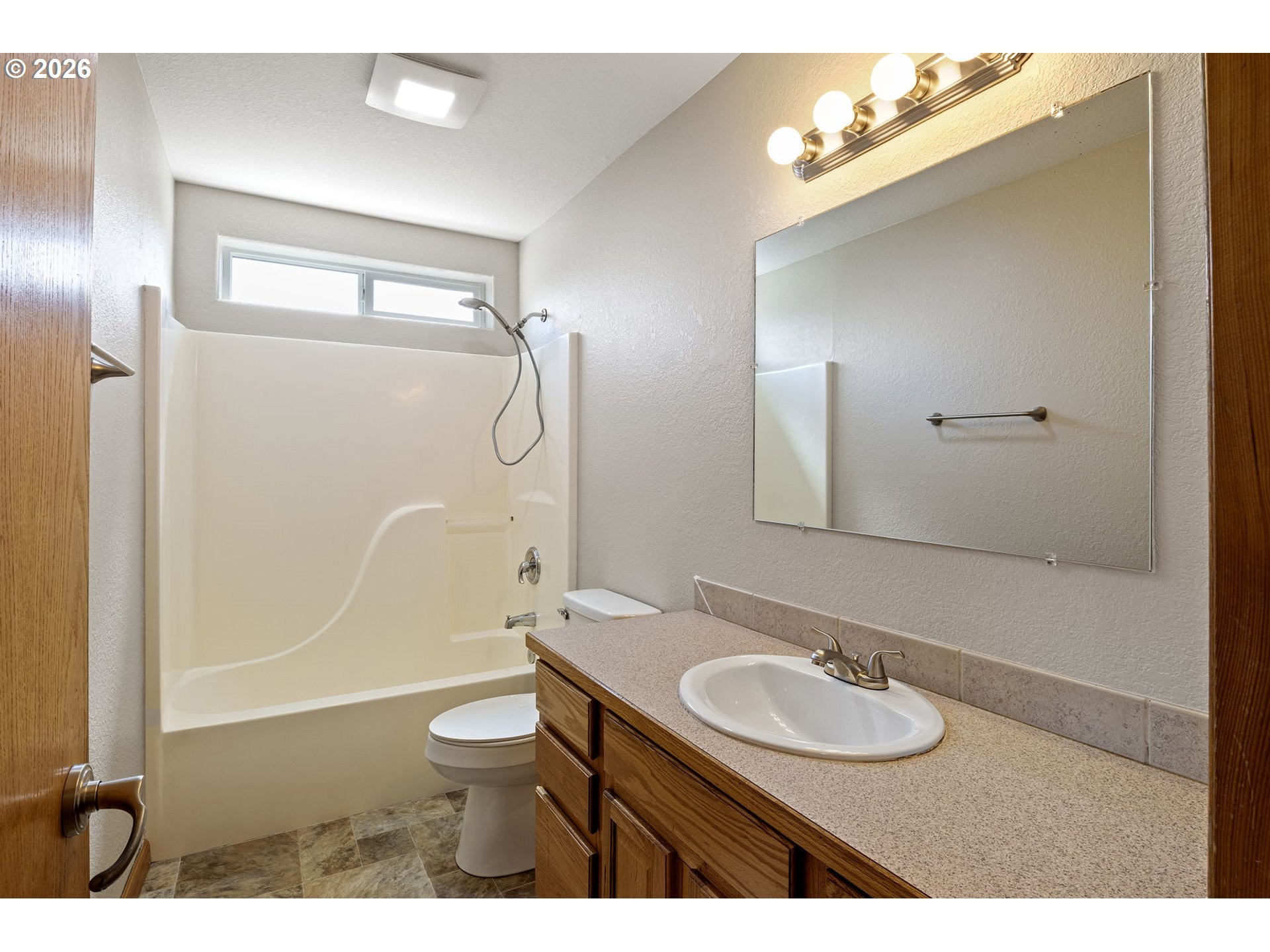 223 Armande Loop Roseburg, OR 97471 - Photo 21 of 35 a bathroom with a sink a toilet and shower