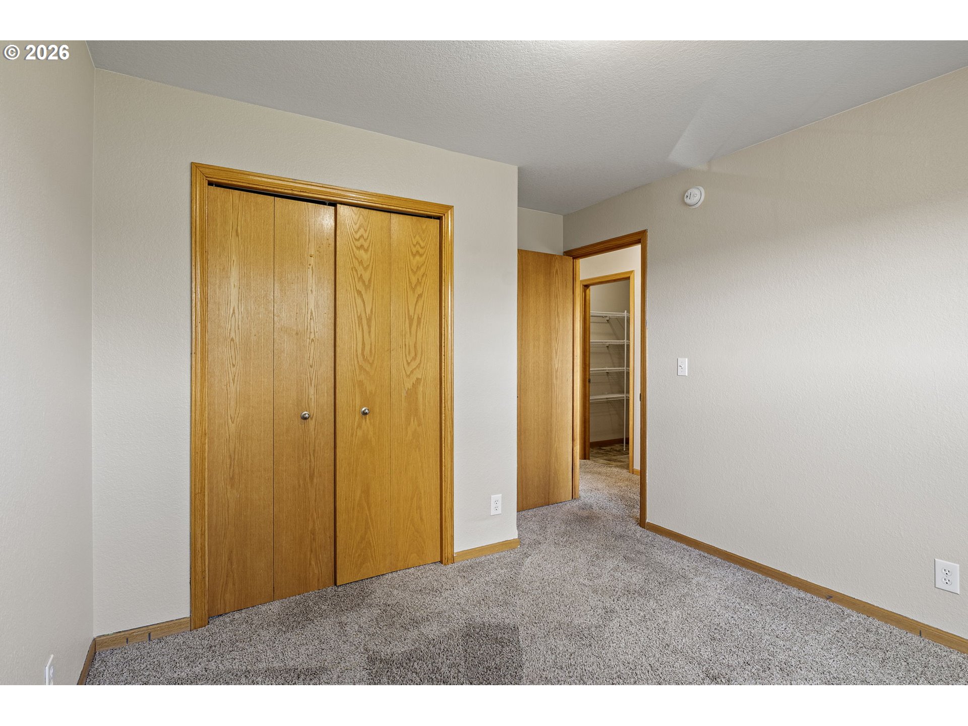 223 Armande Loop Roseburg, OR 97471 - Photo 24 of 35 a view of an empty room with closet and a window
