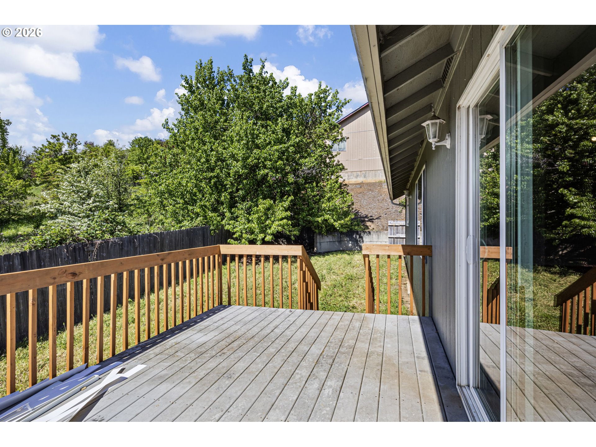 223 Armande Loop Roseburg, OR 97471 - Photo 30 of 35 a view of balcony with wooden floor and fence