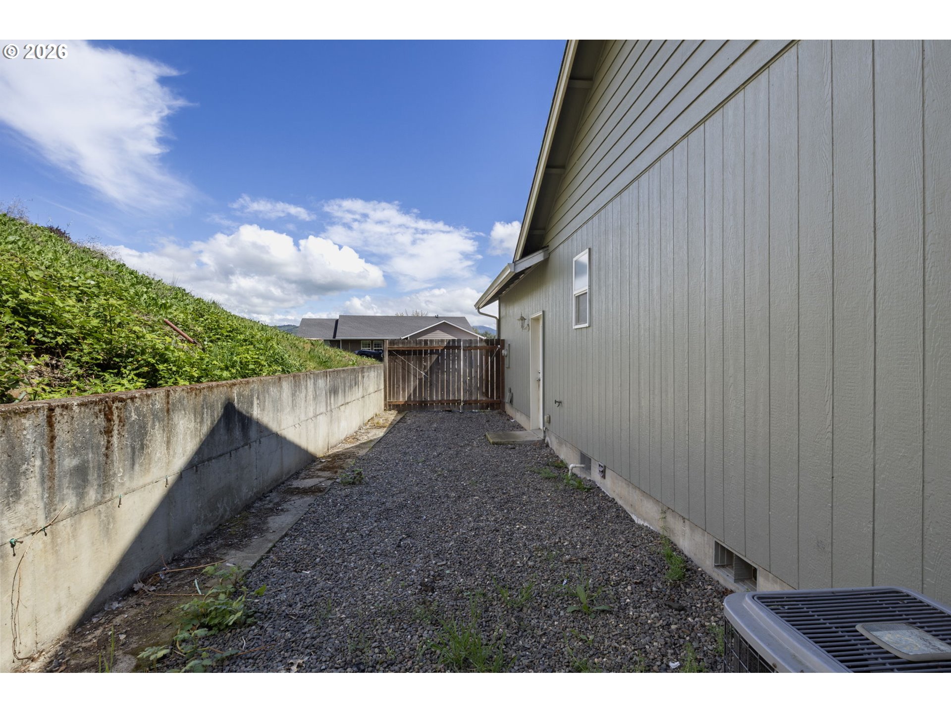 223 Armande Loop Roseburg, OR 97471 - Photo 35 of 35 a view of a house with a yard