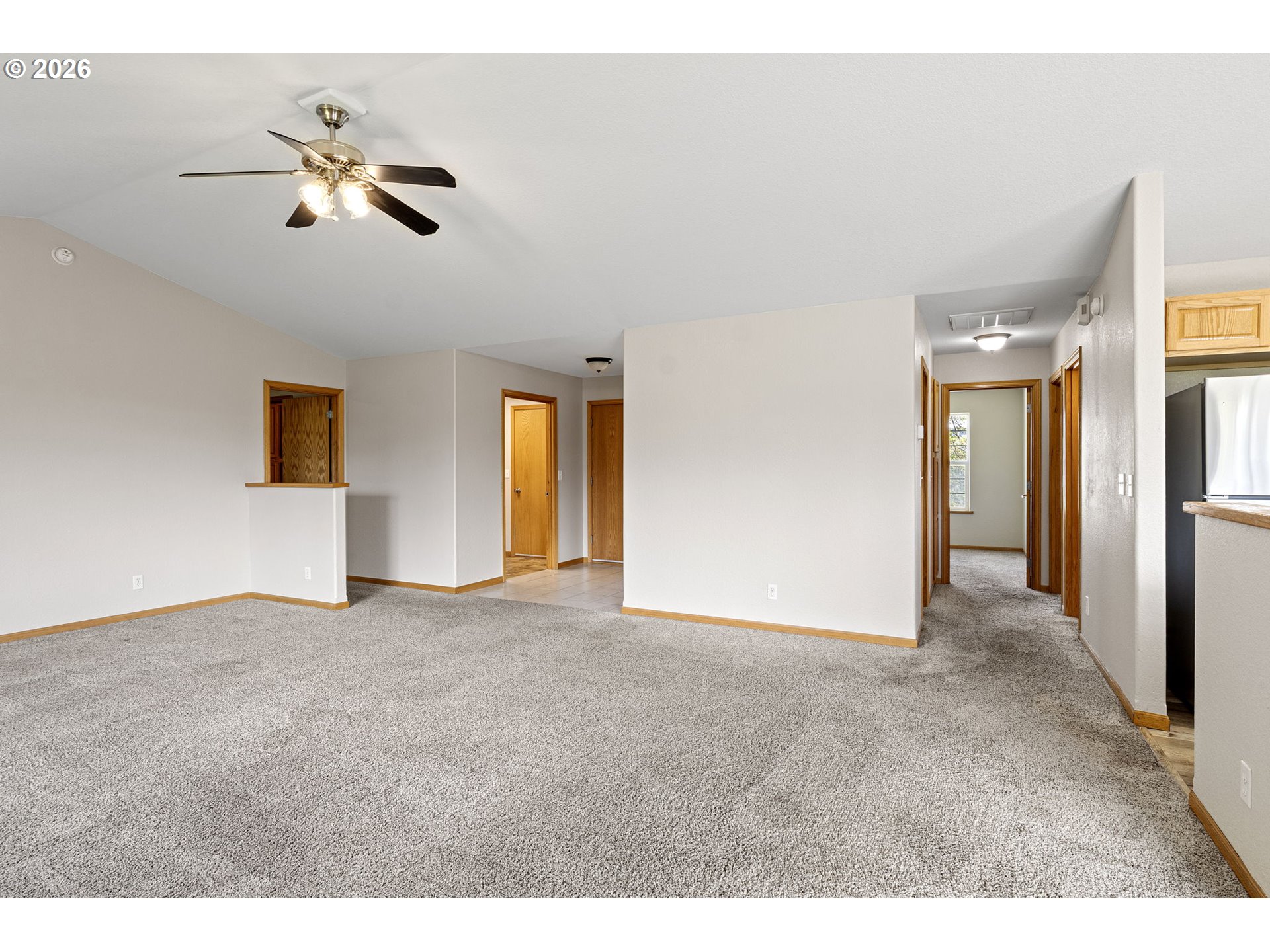 223 Armande Loop Roseburg, OR 97471 - Photo 5 of 35 a view of a livingroom with a ceiling fan and window